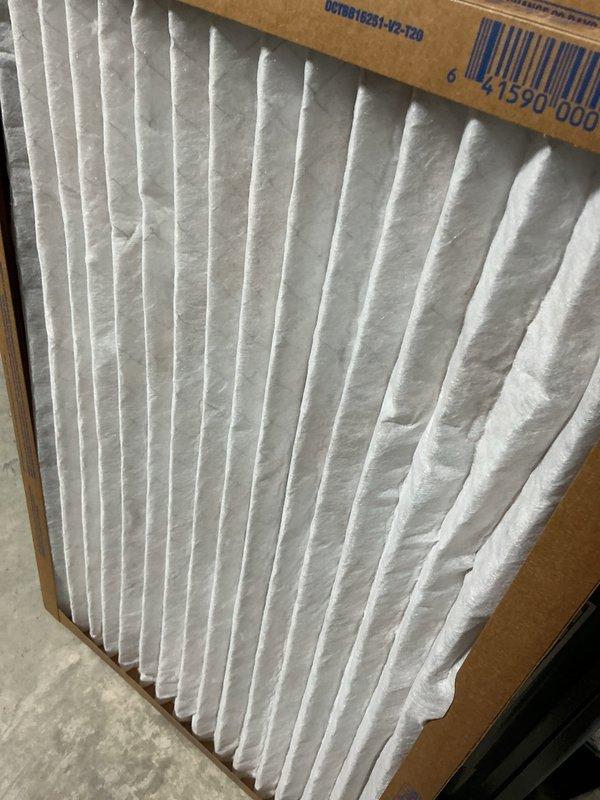 Responded to no-cool complaint on 5-year-old residential HVAC system experiencing inadequate cooling performance and inability to recover from temperature setpoint deviations. Upon arrival, performed visual inspection of outdoor condensing unit and identified heavily restricted condenser coil with significant debris accumulation blocking airflow. Documented coil condition with photographs showing dirt, dust, and cobweb buildup on louvers and fins. Homeowner declined further diagnostic testing and elected to perform condenser coil cleaning themselves based on prior experience with similar issue. System requires condenser coil cleaning to restore proper heat rejection and cooling capacity.