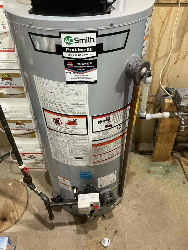 Performed comprehensive AC tune-up on existing system, including cleaning of routine components, filter inspection, and testing of all equipment. Removed dead mouse from unit, cleaned and secured electrical wiring connections, and verified proper system operation. Documented equipment make, model, and serial numbers with photographs for maintenance records.
