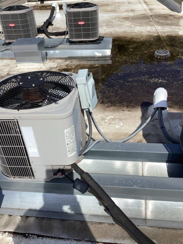 Completed comprehensive preventative maintenance agreement service on multi-unit HVAC system including rooftop condensing units and attic-mounted air handler. Performed standard tune-up procedures, inspected refrigerant lines and connections, verified blower wheel operation, and documented equipment condition with no issues found requiring immediate attention.