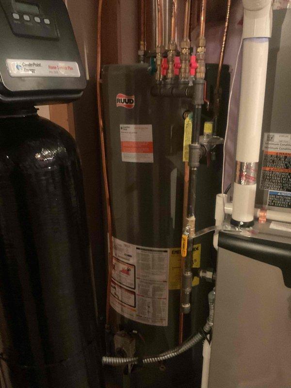 Responded to callback for pilot light issues on two fireplaces after recent HVAC system installation where gas supply had been shut off during the installation process. Successfully relit pilot lights on both fireplace units and verified proper operation. System documentation photos captured showing Lennox furnace installation, air handler with ductwork, and associated mechanical equipment in utility space.