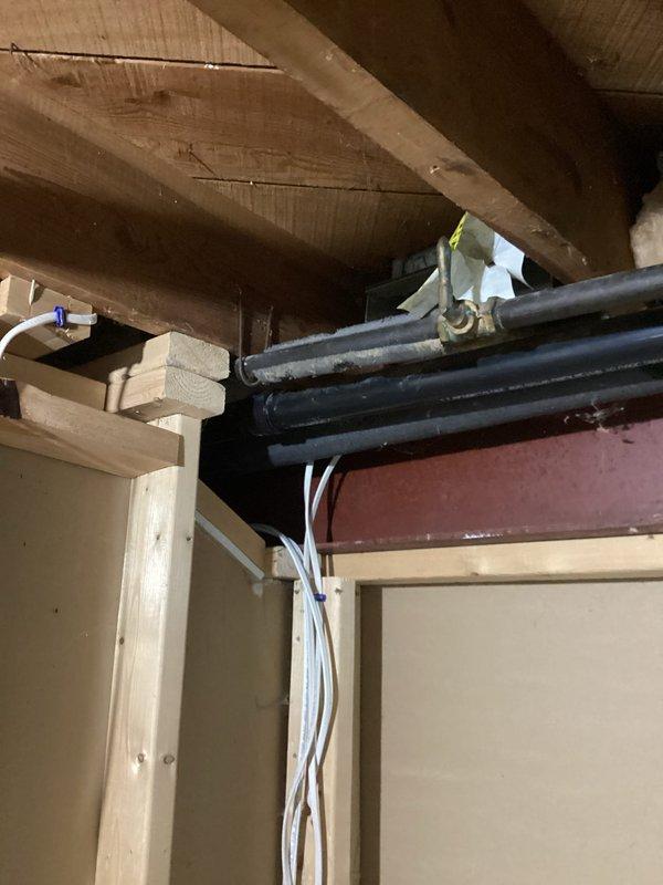 Responded to emergency gas leak call and confirmed gas odor originating from leaking elbow fitting in inaccessible area behind kitchen stove. Shut off gas supply to home for safety. Accessed affected gas line section, removed failed elbow fitting, and installed new gas line section with new shut-off valve using proper brass fittings and approved materials. Pressure tested repaired section to verify leak-free connections per code requirements. Restored gas service to home and relit water heater pilot light, confirming proper operation before departure.