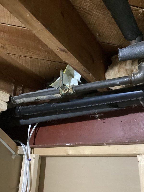 Responded to emergency gas leak call and confirmed gas odor originating from leaking elbow fitting in inaccessible area behind kitchen stove. Shut off gas supply to home for safety. Accessed affected gas line section, removed failed elbow fitting, and installed new gas line section with new shut-off valve using proper brass fittings and approved materials. Pressure tested repaired section to verify leak-free connections per code requirements. Restored gas service to home and relit water heater pilot light, confirming proper operation before departure.