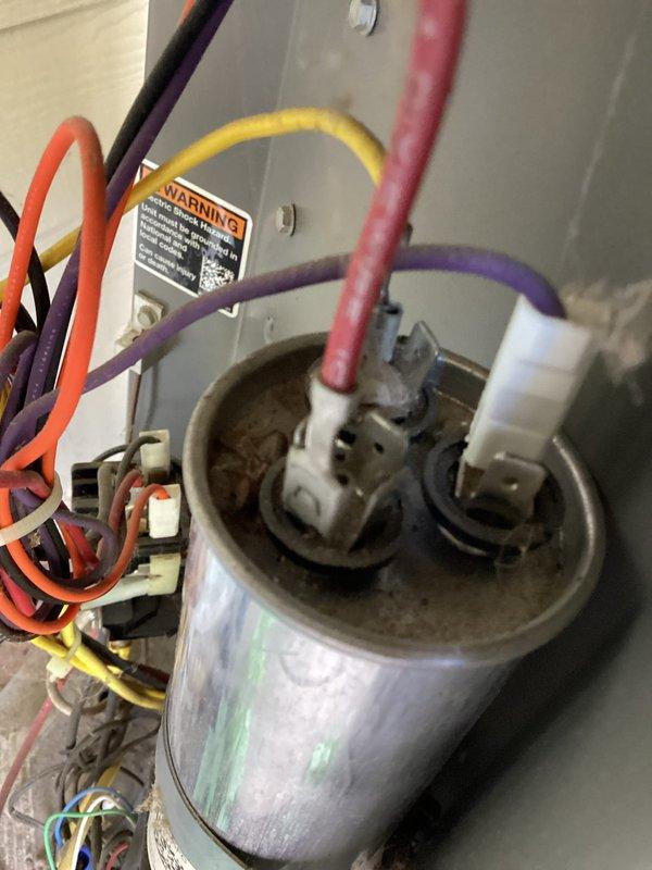 Completed air conditioner tune-up maintenance in conjunction with water heater installation. Identified and replaced weakening capacitor on condenser fan motor and faulty furnace door safety switch to ensure proper system operation and safety compliance.