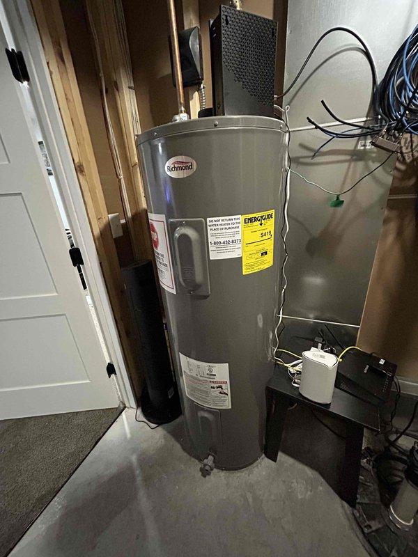 Performed comprehensive AC tune-up on 5-year-old residential air conditioning system. Cleaned outdoor condenser coil and inspected electrical connections at condensing unit. Performed drain line blow-through and replaced filter. System operating properly with no deficiencies identified at time of service.