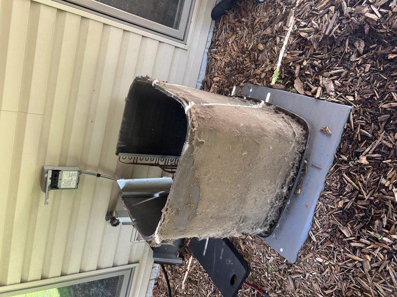 Performed routine maintenance on residential air conditioning system. Started unit and cleared condensate drain line. Cleaned heavily soiled condenser coil that was covered with accumulated dirt and debris. Conducted system diagnostics and found unit achieving only 10° temperature differential, indicating performance issues. Testing revealed weak capacitor and low refrigerant charge. Replaced capacitor and recharged system to manufacturer specifications to restore proper cooling capacity. Customer has estimate appointment scheduled for potential system replacement.