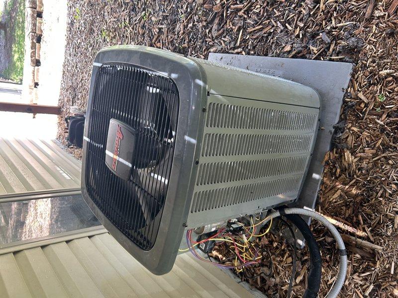 Performed routine maintenance on residential air conditioning system. Started unit and cleared condensate drain line. Cleaned heavily soiled condenser coil that was covered with accumulated dirt and debris. Conducted system diagnostics and found unit achieving only 10° temperature differential, indicating performance issues. Testing revealed weak capacitor and low refrigerant charge. Replaced capacitor and recharged system to manufacturer specifications to restore proper cooling capacity. Customer has estimate appointment scheduled for potential system replacement.