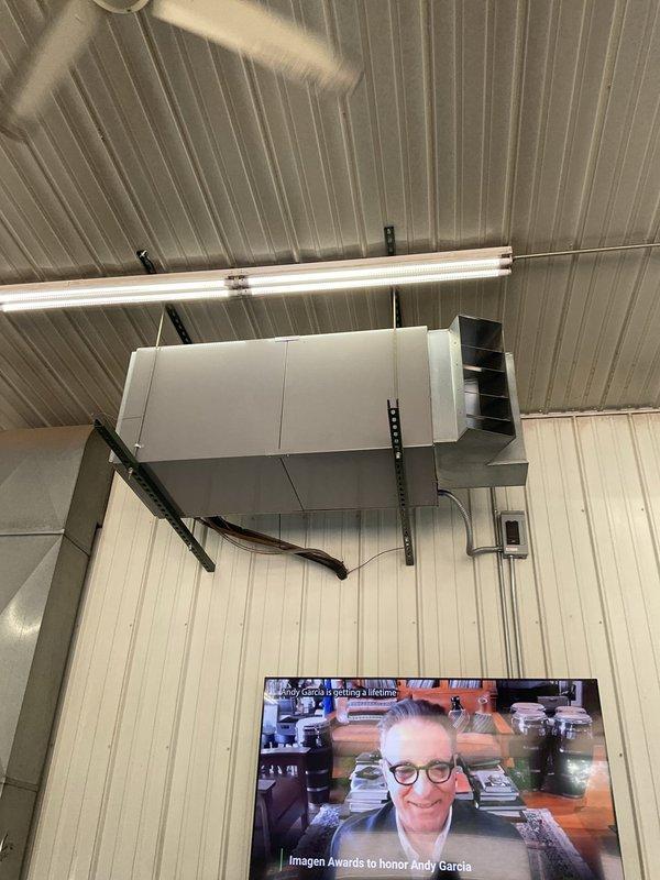 Responded to no cooling call for commercial shop air conditioning unit. Upon arrival, found capacitor had failed, causing motor to overheat and unit to not operate. Replaced defective capacitor, tested system operation, and verified unit returned to normal cooling function.