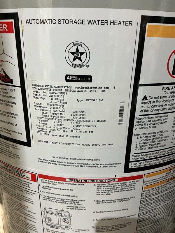 Responded to request for estimate on rerouting water heater venting due to upcoming roof replacement eliminating existing chimney penetration. Assessed current configuration with standard atmospheric venting through chimney and provided options for alternative venting solutions. Customer approved installation of power vent conversion system to eliminate need for vertical chimney vent.

Removed existing 40-gallon natural gas atmospheric vent water heater and associated chimney venting. Installed new 40-gallon natural gas power vent water heater with Bradford White power vent motor assembly. Rerouted exhaust venting horizontally through basement wall to exterior of structure using PVC vent piping system. Reconfigured cold water supply and hot water distribution piping to new unit location. Connected natural gas supply line to new water heater per manufacturer specifications.

Pressurized system and performed leak check on all water connections, gas connections, and vent terminations. Ver