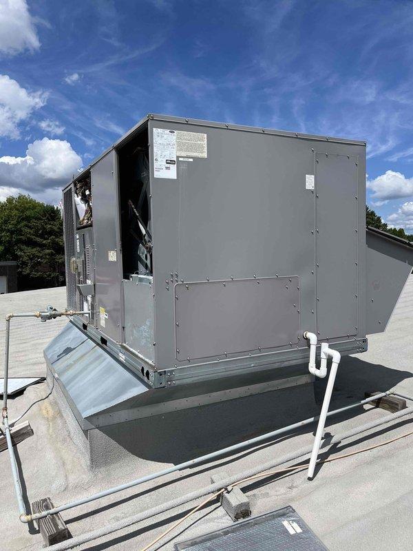 Responded to no cooling complaint on commercial rooftop units. Diagnosed intermittent blower motor operation on RTU, which would run approximately 20 minutes before shutting down with fault code on blower control module. Identified missing leg of power to unit causing blower motor failure. Replaced faulty fuse, restoring proper voltage and unit operation.