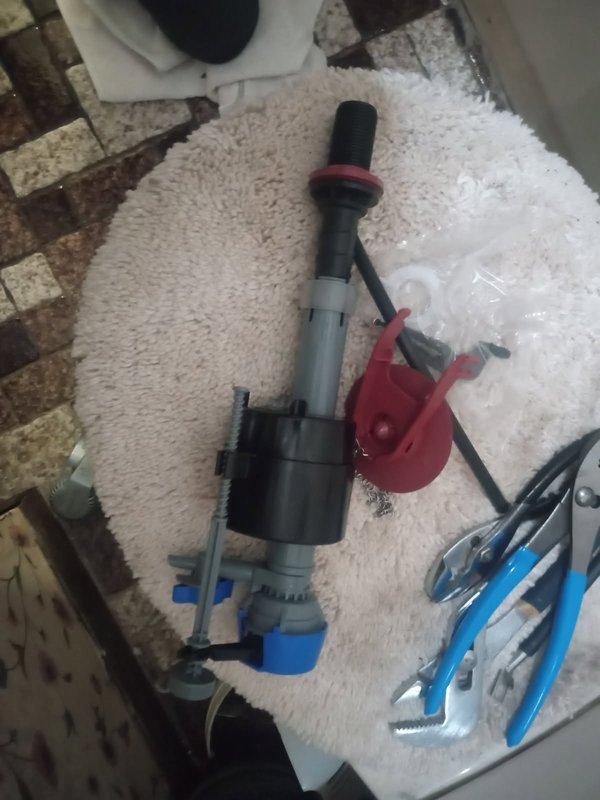 Responded to emergency service call for the only toilet in residence that had been damaged by homeowner during attempted DIY repair, resulting in a hack-sawed supply line and active leak. Disassembled and removed damaged toilet fill valve assembly, assessed extent of damage to internal components and supply connections. Installed customer-supplied replacement fill valve mechanism, including new float assembly, seals, and associated hardware. Tested system for proper operation and verified no leaks present upon completion.