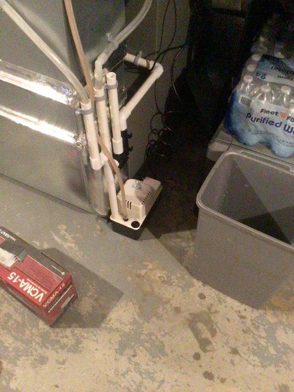 Responded to warranty call for HVAC system experiencing abnormal clunking and grinding noises during shutdown cycle and excessive runtime. Diagnosed malfunctioning condensate pump that continued running continuously and would not shut off automatically. Replaced defective condensate pump with new unit and performed three complete operational cycles to verify proper function and automatic shutoff sequence. System now operating within normal parameters with no abnormal sounds.
