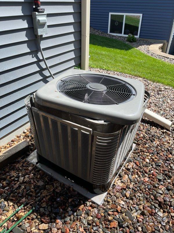 Completed comprehensive air conditioning tune-up and preventive maintenance per service agreement. Inspected and verified air filter in clean condition, supplied additional filter for future use. Evaluated blower assembly, confirming proper balance and cleanliness. Inspected evaporator coil, verified clean condition and proper condensate drainage. Performed electrical inspection on outdoor condensing unit, cleaned condenser coil, and verified all components operating within specifications. Conducted extended system operation test with 15-minute runtime, measuring 17-18 degree temperature differential across evaporator, confirming optimal cooling performance. All equipment operating as designed with no deficiencies noted.