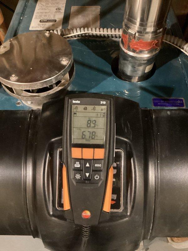 Completed comprehensive boiler tune-up including full combustion analysis and safety testing using calibrated diagnostic equipment. Thoroughly tested all electrical components including four zone valves and inducer motor to verify proper operation. Cleaned burners and combustion chamber, removing accumulated debris and buildup. Inspected and tested domestic hot water side of system including tank condition, temperature and pressure readings across all zones. Verified proper operation of all four thermostats and their respective heating zones. All combustion parameters measured within manufacturer specifications. System confirmed to be operating safely and efficiently with all components functioning properly at time of service completion.