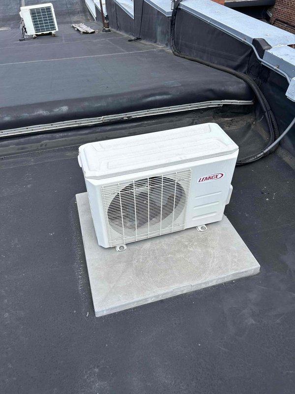 Responded to service call for Lennox mini-split system experiencing intermittent cooling failure after approximately 20 minutes of operation. Accessed rooftop unit and performed diagnostic testing using refrigerant manifold gauges, which revealed system operating with R410A refrigerant at pressures of 110 PSI low side and 107 PSI high side. Upon inspection, discovered blower wheel heavily contaminated with dirt and debris, restricting airflow and causing system to shut down on safety controls. Documented equipment condition and refrigerant pressures; scheduled follow-up visit to perform complete blower wheel cleaning with pump and chemical cleaner to restore proper airflow and system performance.