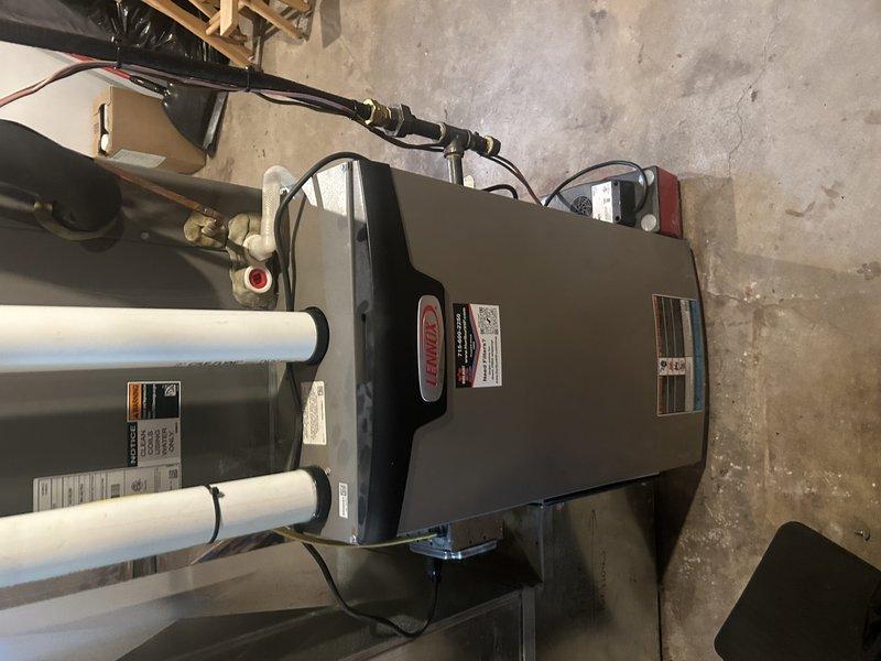 Performed comprehensive HVAC maintenance tune-up including AC operational testing, condensate drain clearing, air filter replacement, condenser coil washing, and component inspection. Verified proper system cooling performance with temperature drop measurements at basement unit, confirming optimal operation throughout.