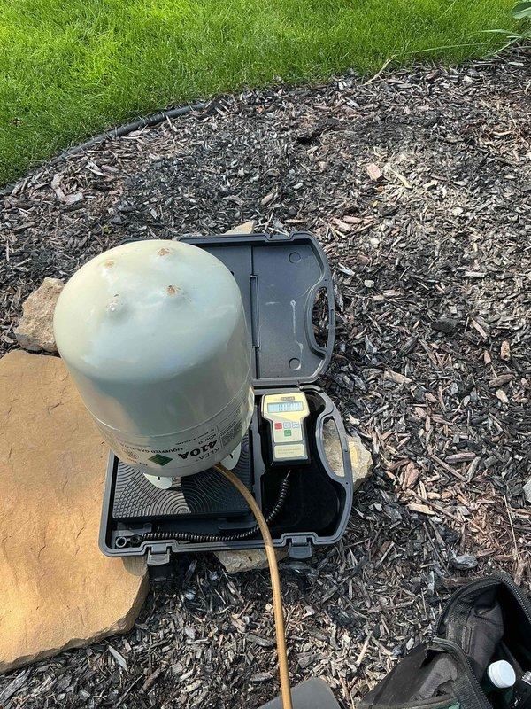 Performed comprehensive A/C tune-up on outdoor condensing unit. Upon inspection, discovered low refrigerant level and missing service port caps. Recharged system to manufacturer specifications using recovery equipment and installed locking caps on service ports to prevent future refrigerant loss and contamination. Unit operating within normal parameters upon completion.