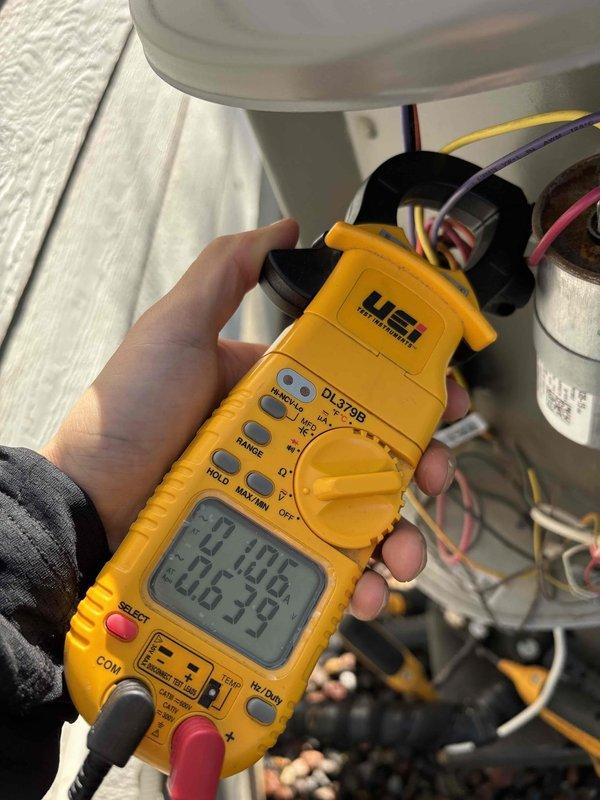 Performed comprehensive AC maintenance on single 410A refrigerant system with ambient temperature at 84 degrees. Conducted thorough inspection of air filter, thermostat operation, temperature split, condenser unit, evaporator and condenser coils, blower motor, capacitors, compressor, refrigerant charge level, and condensate drain system. 

Diagnostic testing revealed elevated superheat readings indicating low refrigerant charge, which correlated with reported inadequate cooling performance. Measured electrical values using digital multimeter to verify capacitor and motor operation within specifications. Monitored supply and return air temperatures to confirm insufficient temperature differential prior to repair.

Upon approval, recharged 410A refrigerant system to manufacturer specifications to restore proper cooling capacity. Added UV dye solution to refrigerant circuit to facilitate future leak detection and diagnosis. Verified system operation post-repair with all components functio