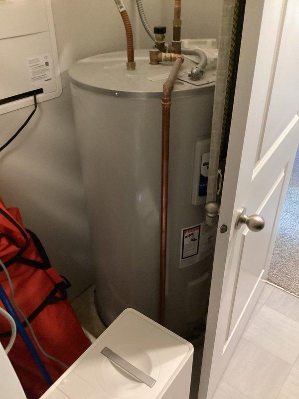 Responded to a no cooling complaint on a 3-year-old Bryant air conditioning system. Upon arrival, found the system was severely overcharged by over one pound of refrigerant due to improper service performed by an unqualified technician. Recovered the entire refrigerant charge from the system and performed nitrogen flow test through the low side, which showed no restrictions or blockages. Attempted to recharge the system to factory specifications using the recovered refrigerant, but observed erratic TXV operation indicating valve failure. 

During inspection, discovered the seasonal damper for the main floor zone was completely closed, restricting airflow. Opened the damper to proper position to restore air distribution. Due to the contaminated refrigerant from the improper previous service and the failed TXV, determined that complete refrigerant replacement with virgin R410A will be required along with TXV and filter drier replacement. System requires TXV replacement, new filter drier 