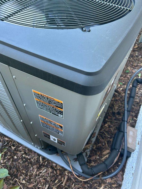 Responded to warranty call regarding red LED light on thermostat and fan operation concerns on system installed in March. Upon inspection, confirmed red LED indicates normal thermostat power status and outdoor fan cycling is part of routine self-monitoring and pressure management functions. Verified refrigerant pressures within specification, inspected furnace components including air filter and temperature sensor with all readings normal. Provided customer education on proper system operation and thermostat functionality, confirming unit operating as designed with no defects found.
