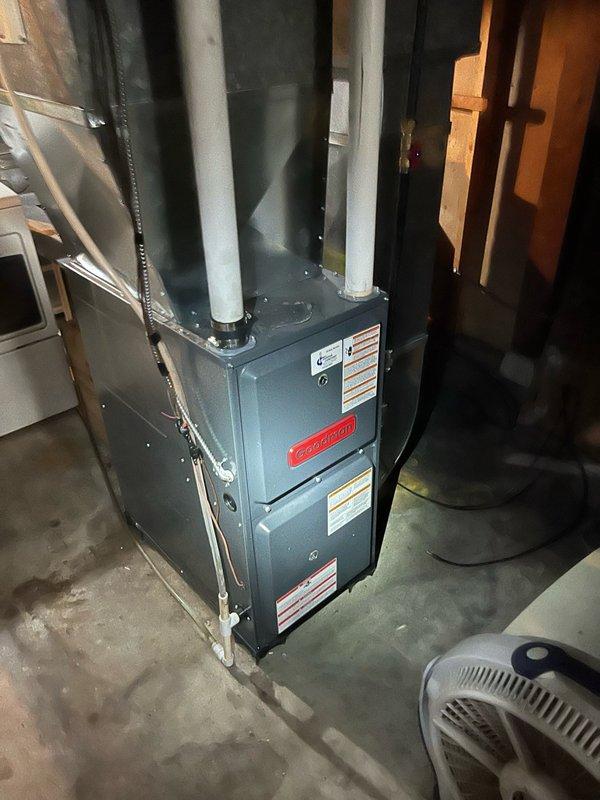 Responded to no cooling complaint on 12-year-old Carrier central air conditioning system with Goodman furnace. Customer had shut down unit after observing ice formation at outdoor unit. Performed diagnostic evaluation and found all electrical components operating within specifications with compressor, condenser fan, and blower motor engaging properly. System pressures indicated critically low R-22 refrigerant charge, confirming active leak in refrigerant circuit. Discussed findings with customer, explaining age-related concerns, R-22 phase-out implications, and repair cost considerations. Recommended obtaining repair estimates and replacement system pricing for comparison. Customer agreed to proceed with advisor consultation scheduled for following day.