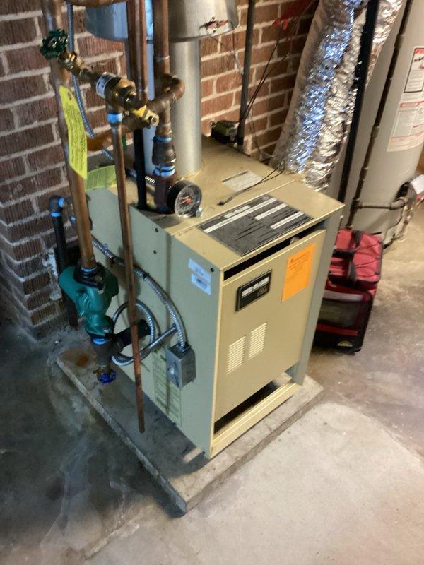 Responded to service call for 11-year-old Santa Fe Elite dehumidifier (P/N 4029720) with complaints of no warm discharge air, no water collection, and non-operational condensate pump while fan continued to run. Upon arrival, confirmed fan operation but compressor failure to start. Tested 45mf capacitor which read within acceptable range at 45.23mf. Performed diagnostic bypass of dehumidistat and defrost termination switch to supply direct power to compressor, which failed to start, confirming compressor failure. Advised that compressor replacement would exceed cost-effectiveness for unit of this age and condition. Recommended office follow-up for replacement unit quote or scheduling comfort advisor consultation for new equipment options.