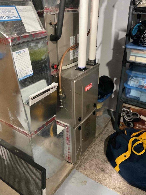 Responded to service call regarding a 50-gallon natural gas water heater with visible corrosion at the top of the tank where the cold water supply line connects. Performed on-site inspection and documented the rusting condition with photographs. Discussed warranty coverage options and addressed all customer concerns regarding the water heater's condition and potential next steps for replacement or repair.