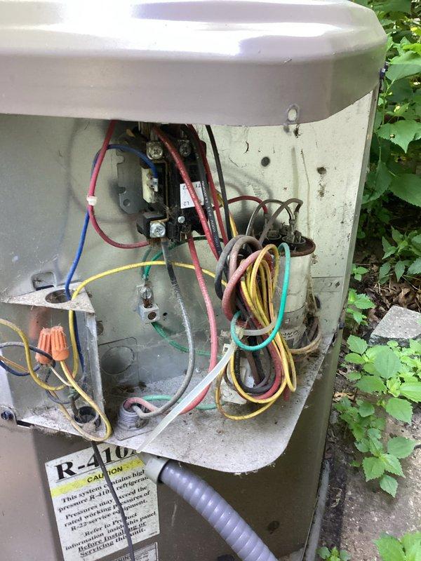 Provided second opinion on 15-year-old residential air conditioning system experiencing inadequate cooling performance and suboptimal airflow throughout home. Upon inspection, confirmed system is low on refrigerant charge, indicating potential refrigerant leak in system. Explained comprehensive leak search process and various repair scenarios that may result from leak detection. Discussed homeowner's concerns regarding insufficient airflow despite recent duct cleaning, inability to reach thermostat setpoint, and known insulation deficiencies in upper level causing excessive heat in primary bedroom. Explored alternative cooling solution options including mini-split installation for problem area. Documented system condition with exterior condenser unit photographs showing 15-year-old equipment with R-410A refrigerant, visible wiring configuration, and general age-related wear. Provided detailed repair options via email including leak search and recharge procedure. Discussed benefits of p