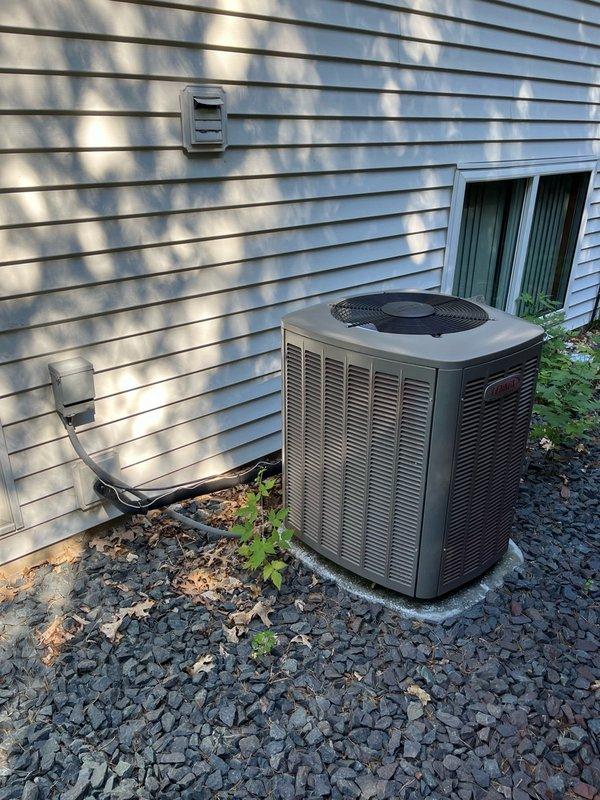 Completed comprehensive AC tune-up on 3-year-old Lennox system as part of Family Rewards maintenance agreement. Performed full inspection of indoor and outdoor components, verified air filter had been recently replaced and blower assembly was clean and properly balanced. Inspected evaporator coil, confirmed clear and draining properly. Conducted electrical testing at outdoor condenser unit with all readings within manufacturer specifications, cleaned condenser coils. Ran system through complete operational cycle for 15 minutes, measured 18-20 degree temperature split across evaporator, confirming proper refrigerant charge and system performance. All components operating to specifications with no issues identified.