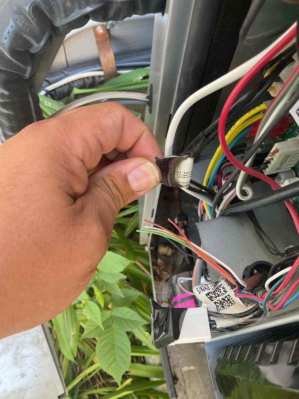 Responded to no cooling complaint on heat pump system displaying E434 error code on thermostat and outdoor unit. Performed comprehensive diagnostic including voltage testing at multiple points throughout the system. Rewired all low voltage connections at thermostat, furnace, and heat pump, verifying proper 26VAC supply to outdoor unit. Traced E434 inverter board error to loss of 240V power supply at both inverter board and contactor. Tested disconnect and fuses, which showed good continuity. Identified faulty disconnect as root cause preventing proper voltage delivery to system components despite functioning fuses. Corrected low voltage wiring issues found during inspection. Recommended electrician verify breaker and line voltage wiring integrity prior to disconnect replacement to ensure no upstream electrical issues exist. System requires disconnect replacement to restore full operation.