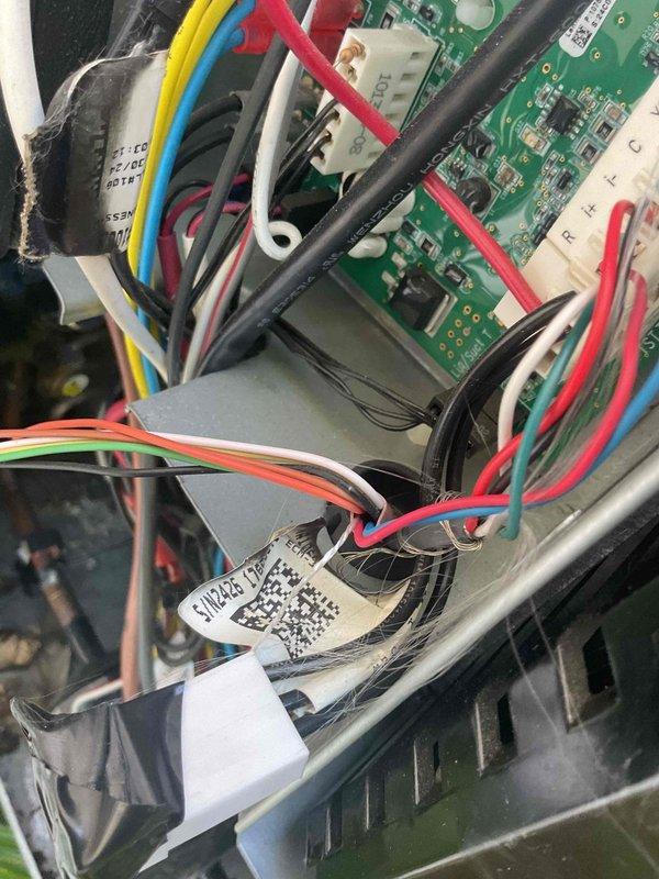 Responded to no cooling complaint on heat pump system displaying E434 error code on thermostat and outdoor unit. Performed comprehensive diagnostic including voltage testing at multiple points throughout the system. Rewired all low voltage connections at thermostat, furnace, and heat pump, verifying proper 26VAC supply to outdoor unit. Traced E434 inverter board error to loss of 240V power supply at both inverter board and contactor. Tested disconnect and fuses, which showed good continuity. Identified faulty disconnect as root cause preventing proper voltage delivery to system components despite functioning fuses. Corrected low voltage wiring issues found during inspection. Recommended electrician verify breaker and line voltage wiring integrity prior to disconnect replacement to ensure no upstream electrical issues exist. System requires disconnect replacement to restore full operation.