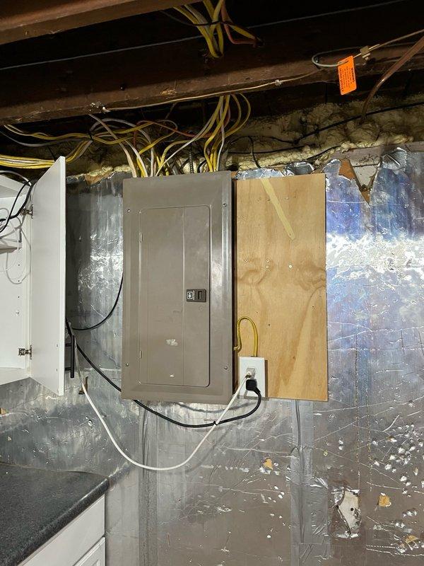 Responded to no cool call on 10-year-old central air conditioning system. Upon arrival, found thermostat calling for cooling but compressor not running and condenser fan spinning at extremely low RPM. Diagnosed failed dual-run capacitor affecting both compressor and fan motor operation. Fan motor was excessively hot to touch with burnt odor present from prolonged operation at reduced speed. Contactor showed significant pitting on contact points.

Discussed findings with homeowner and explained that while capacitor replacement would restore immediate operation, the fan motor showed signs of thermal damage from running under failed capacitor conditions. Homeowner authorized capacitor replacement to restore cooling function. Installed new dual-run capacitor and energized system for testing. Compressor and condenser fan motor operated normally. Verified system pressures were within acceptable range during test cycle.

Due to observed conditions of fan motor (thermal damage and burnt odor),