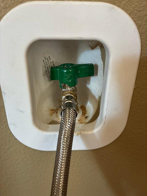 Responded to a service call for a refrigerator water supply issue where the existing icemaker shut-off valve handle had broken off, preventing the homeowner from controlling water flow to the appliance. Upon arrival, assessed the damaged compression-style valve assembly located in the wall-mounted outlet box and determined replacement was necessary for proper operation and safety.

Removed the failed shut-off valve and installed a new quarter-turn icemaker shut-off valve with green T-handle for easy operation. Connected the existing braided stainless steel flexible supply line to the new valve assembly, ensuring proper thread engagement and seal integrity at all connection points. Restored water supply to the refrigerator and conducted a thorough leak inspection of the valve body, handle assembly, and flex hose connections. Verified system was functioning correctly with no leaks detected and confirmed adequate water flow to the appliance.
