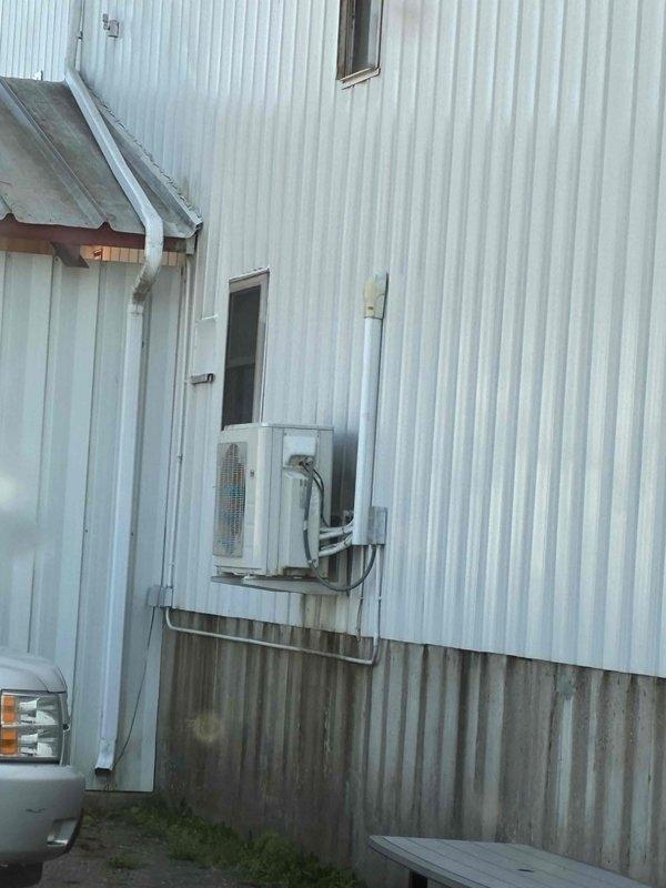 Responded to service call for mini split system with inadequate airflow in office area. Upon inspection, found both indoor air handler units operational but producing minimal airflow despite blower motors running. Diagnosed severely clogged blower wheels restricting air circulation in both heads. Provided updated estimate for complete blower wheel cleaning service, which was approved. System currently maintaining cooling function but operating at reduced capacity. Scheduled follow-up appointment to perform thorough cleaning of blower wheels and evaporator coils using appropriate cleaning solutions and containment equipment to restore proper airflow and system performance.