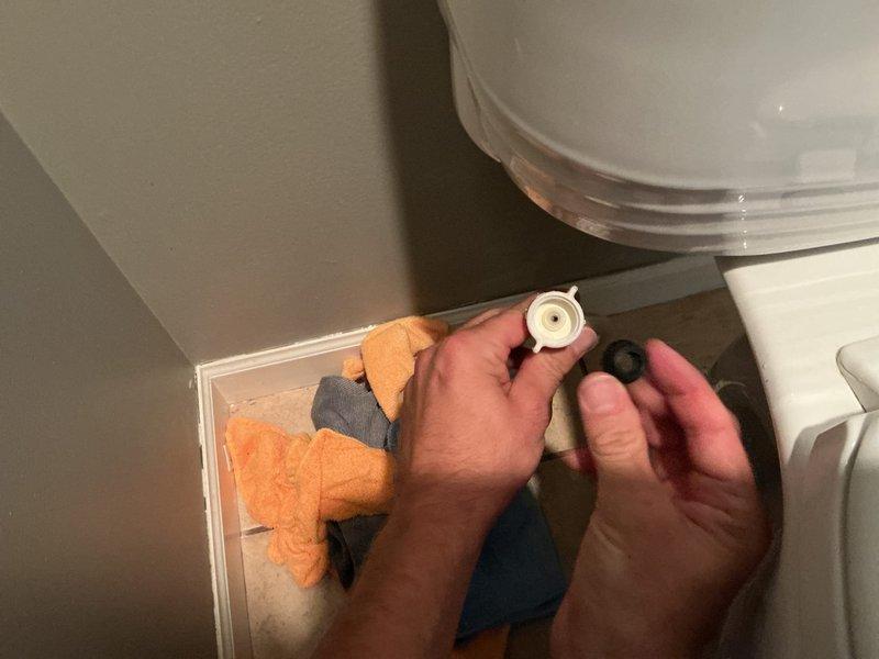 Responded to a toilet fill valve leak following homeowner's DIY replacement attempt. Upon diagnostic inspection, identified two missing components: the refill tube connecting the fill valve to the flush valve and the water supply line gasket. Located the original supply line gasket on-site and inspected for wear and damage; gasket condition was acceptable for reinstallation. Installed the gasket to the water supply connection and attached the refill tube from the fill valve to the overflow tube on the flush valve. Tested system operation to verify proper fill cycle, water level, and leak-free connections at all points. Noted aging flapper valve showing signs of deterioration and recommended replacement; homeowner elected to complete flapper replacement independently. System restored to proper working order with no active leaks detected.