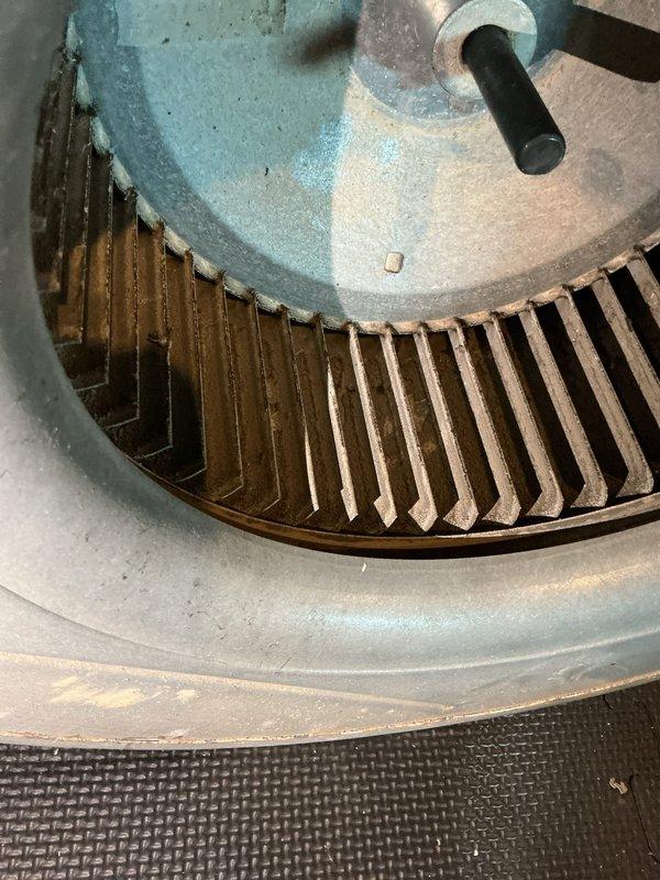 Returned to property to replace defective furnace blower motor. Previously installed motor had failed due to bad bearings and was determined to be faulty out of the box. Removed failed blower motor assembly from furnace air handler unit. Installed new replacement blower motor with squirrel cage blower wheel. Verified proper motor operation, airflow, and system function upon completion.