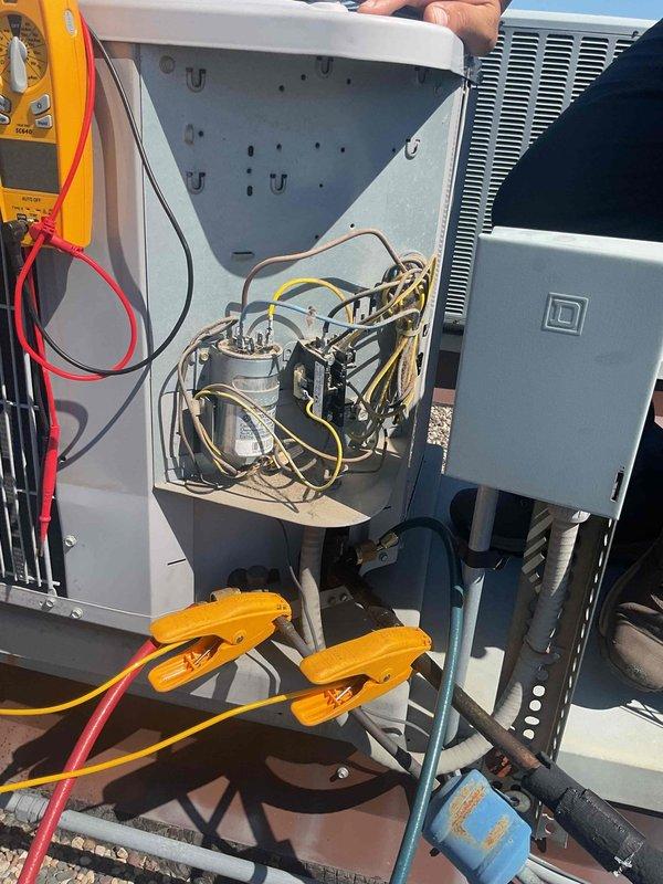 Completed scheduled tune-up maintenance on rooftop HVAC unit after coordinating roof access with front desk. Found heavily soiled 16x20x1 air filter restricting airflow, which was replaced with new filter. Performed comprehensive system diagnostics including electrical component inspection, refrigerant line temperature measurements using clamp meters, and verification of contactor operation. Inspected air handler unit in utility closet, checked brass service valves, PVC condensate drainage, and electrical connections. All system components found operating within normal parameters following filter replacement and routine maintenance procedures.