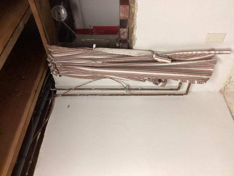 Responded to active water leak located behind refrigerator. Upon arrival, identified failed saddle T-valve as source of leak with water still active to home. Shut off main water supply to prevent further damage. Removed defective saddle T-valve and installed new compression stop valve to properly supply refrigerator water line. Tested installation for leaks, restored water service to home, and verified proper operation of new valve and refrigerator water connection.