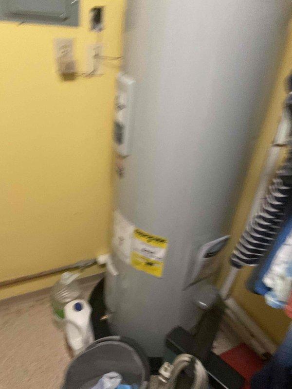 Completed rooftop AC tune-up, accessing unit via key obtained from front desk. Found capacitor reading slightly out of specification and dirty air filter (16x20x1). Replaced defective capacitor and installed new filter to restore system to proper operating parameters.