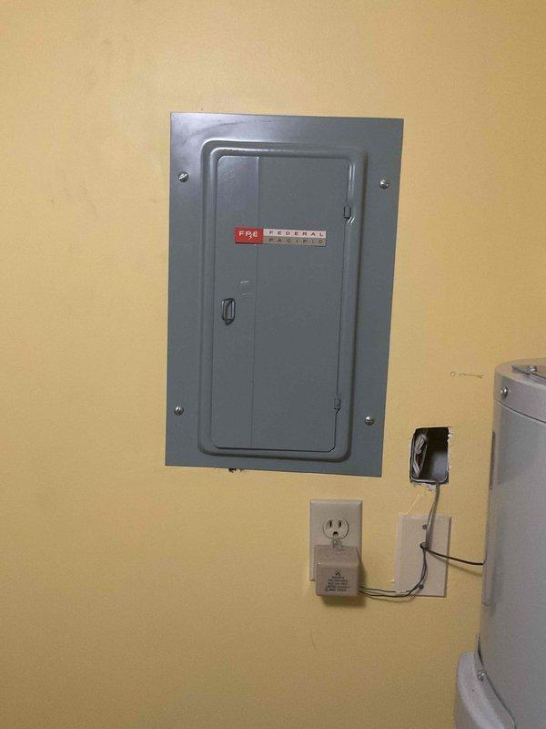 Completed rooftop AC tune-up, accessing unit via key obtained from front desk. Found capacitor reading slightly out of specification and dirty air filter (16x20x1). Replaced defective capacitor and installed new filter to restore system to proper operating parameters.