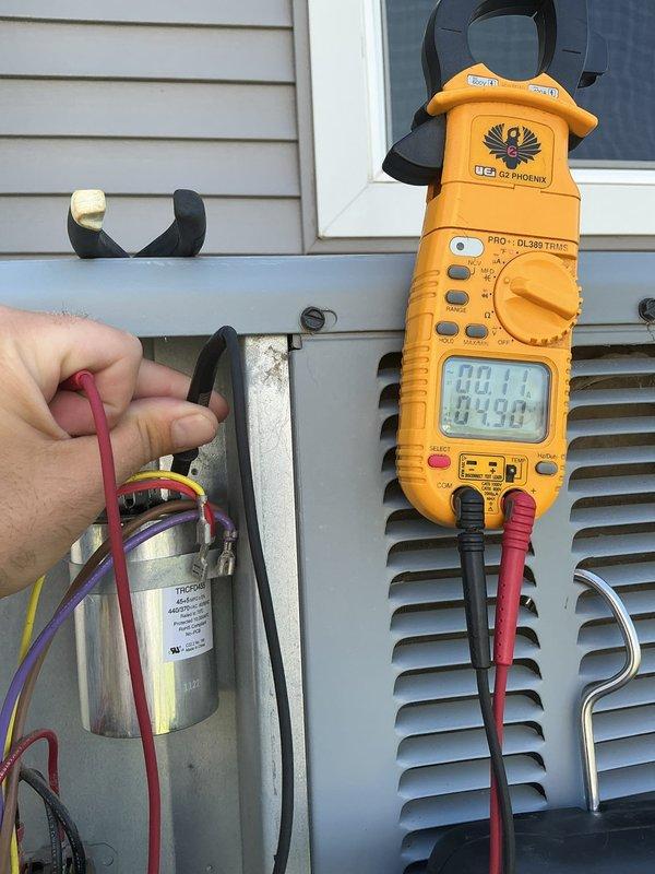 Completed comprehensive AC tune-up on 8-year-old system with all components testing within manufacturer specifications and refrigerant levels confirmed at proper charge. Cleaned dirty outdoor coils and recommended homeowner maintain coils by spraying off once or twice during summer months. Advised customer to use MERV 8 rated filter with monthly replacement schedule for optimal system performance and efficiency.