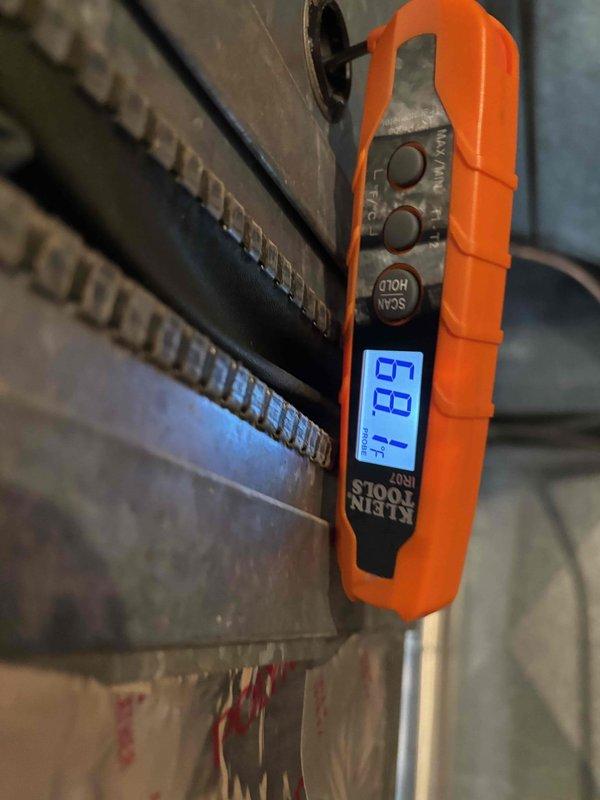 Responded to callback for newly installed A/C system with no cooling on upper floors. Performed comprehensive system diagnostics including thermostat verification, airflow testing at vents, air handler inspection, blower motor operation check, and temperature split measurements. Found subcool reading at 8 degrees, indicating low refrigerant charge. Added 8.6 oz of refrigerant to system, bringing subcool to optimal 12 degrees. Verified system now cooling normally throughout all floors. Recommended filter replacement and scheduled comfort advisor appointment for zone system consultation.