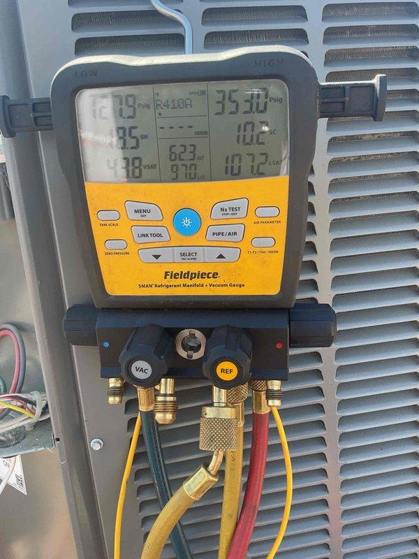 Performed comprehensive AC tune-up on rooftop unit, accessing system through building front desk coordination. Conducted complete system diagnostics using refrigerant manifold gauges, verifying proper pressures, temperatures, and operational parameters across all components. Unit tested and confirmed operating within manufacturer specifications with no deficiencies noted.