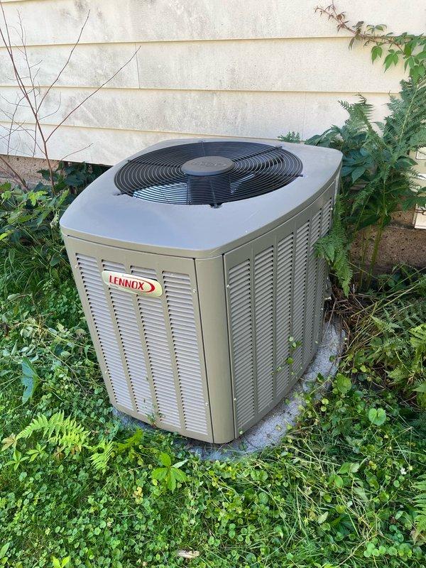Responded to no cooling call on 4-year-old system with previous C2 error code history. Found furnace calling for cooling but outdoor unit not responding. Discovered insect debris lodged in contactor preventing closure and electrical contact. Removed debris from contactor, cleaned contacts, and verified proper operation. Outdoor unit was heavily soiled with accumulated dirt and debris restricting airflow through condenser coil. 

Performed complete system tune-up including thorough cleaning of outdoor condenser unit and coil. Inspected all electrical connections, capacitor values, and refrigerant pressures. All components tested within manufacturer specifications. Verified proper system operation with 18-20 degree temperature split across evaporator coil, indicating adequate cooling capacity and refrigerant charge. System restored to full operational status.