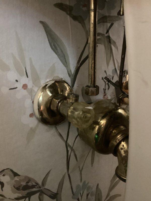 Responded to report of water leaking from pipe underneath sink causing property damage. Upon inspection, identified failed shut-off valves to sink as the source of the leak. Removed old deteriorated valves and installed new brass shut-off valves to both hot and cold water supply lines. Tested all connections for proper operation and verified no additional leaks present. System restored to full functionality.
