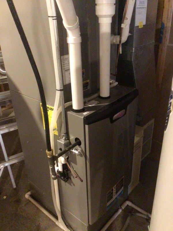 Completed comprehensive AC tune-up on 5-year-old system under maintenance agreement. Performed exterior coil cleaning on condensing unit, verified all electrical connections and amperage readings within manufacturer specifications, and confirmed air filter in excellent condition. System operating properly with no deficiencies noted.