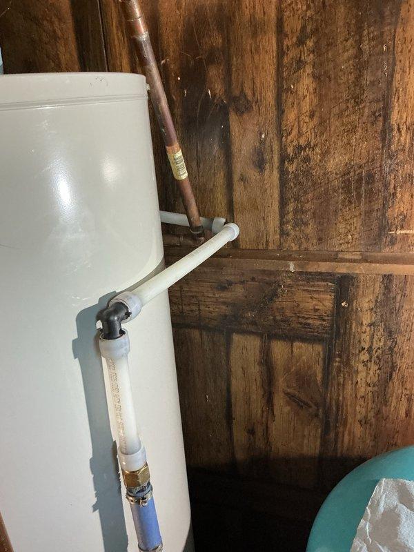 Responded to a water leak emergency caused by a pinhole leak in deteriorated copper piping located between the pressure tank and acid neutralizer. Upon arrival, the main water supply had already been shut off to the home. Inspection revealed the copper line had thinned significantly, resulting in the pinhole failure and active water leak.

Removed approximately 5 feet of compromised copper piping between the pressure tank and acid neutralizer system. Installed new copper piping to replace the failed section, ensuring proper connections and secure fittings at both termination points. Restored main water supply to the home and conducted thorough leak inspection of the repaired section and surrounding plumbing connections. Verified all systems were functioning properly with no additional leaks detected. Left the work area clean and operational with full water service restored to the residence.