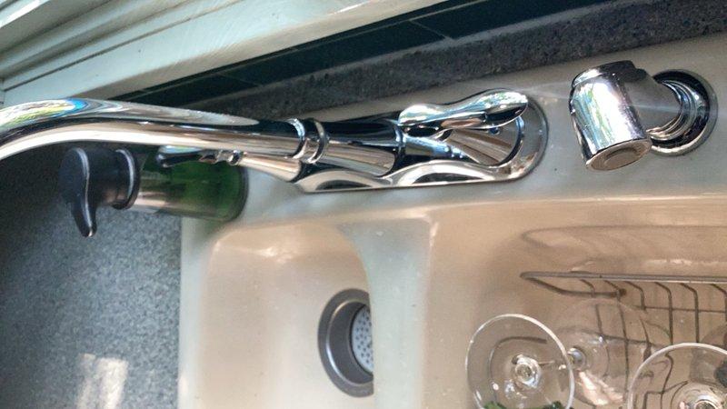Completed comprehensive plumbing inspection of residential property. Tested water pressure at multiple fixtures including kitchen faucet and bathroom installations, recording elevated static pressure of 105 psi, which exceeds the recommended maximum of 80 psi for residential plumbing systems. Inspected kitchen sink area with chrome faucet and side sprayer, confirming proper fixture operation. Evaluated bathroom plumbing including toilet, pedestal sink, and floor-mounted shut-off valves with supply lines in good working condition.

Conducted water quality assessment and identified severe hard water conditions affecting the property. Explained to homeowner the potential long-term effects of excessive water pressure on plumbing fixtures, appliances, and water heater, including premature failure and increased risk of leaks. Provided detailed estimate for installation of pressure reducing valve (PRV) to bring system pressure within safe operating range of 40-60 psi.

Discussed benefits of w
