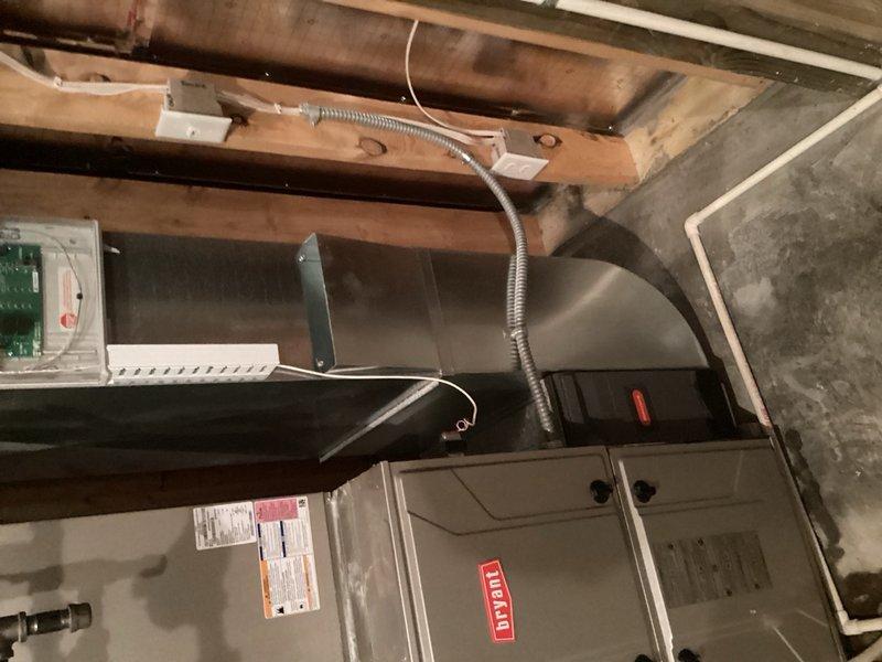 Responded to service call for water quality assessment following plumber's recommendation to test iron levels. Upon arrival, performed iron test on water supply and conducted thorough inspection of existing water treatment equipment. Discovered property already equipped with functional reverse osmosis system serving upstairs refrigerator and downstairs bar area. Explained RO system capabilities and confirmed it adequately addresses drinking water quality concerns. Discussed additional under-cabinet RO installation options for enhanced convenience if desired. Documented existing HVAC and water treatment system configuration including Bryant furnace, water heater, and blue pressure tank with associated copper piping and connections.