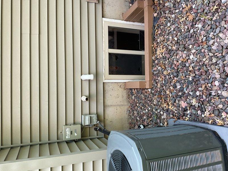 Performed comprehensive maintenance inspection on a 2022 Trane air conditioning unit paired with a 2010 Lennox furnace. The TXV system achieved target subcooling of 10°F with measured subcooling of 10.1°F at 85°F outdoor ambient temperature, and indoor temperature split measured 16.8°F, confirming acceptable cooling performance. Conducted furnace inspection including inducer capacitor check, flame sensor cleaning with Scotch-Brite pad, HSI verification, and operational testing with successful startup confirmed. Recommended replacement of the 5-inch media filter due to loading condition.