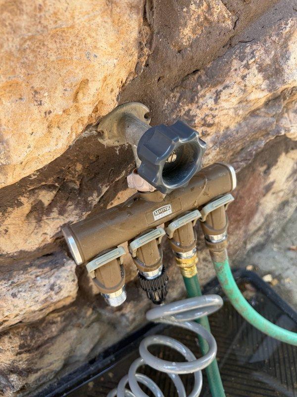 Performed comprehensive plumbing inspection addressing multiple issues including a continuously leaking front exterior hose bib with failed internal stem, reduced water pressure occurring when multiple fixtures operate simultaneously, and high-pitched noise emanating from shower valve during operation. Diagnosed faulty shower diverter contributing to pressure and noise concerns. Inspected recently installed water heater following gas line adjustment by another technician to assess operational noise complaint. Documented condition of outdoor hose bib assembly showing deteriorated stem requiring replacement. Provided estimate for hose bib stem replacement and scheduled follow-up visit for installation of new components to restore proper function and eliminate leakage.